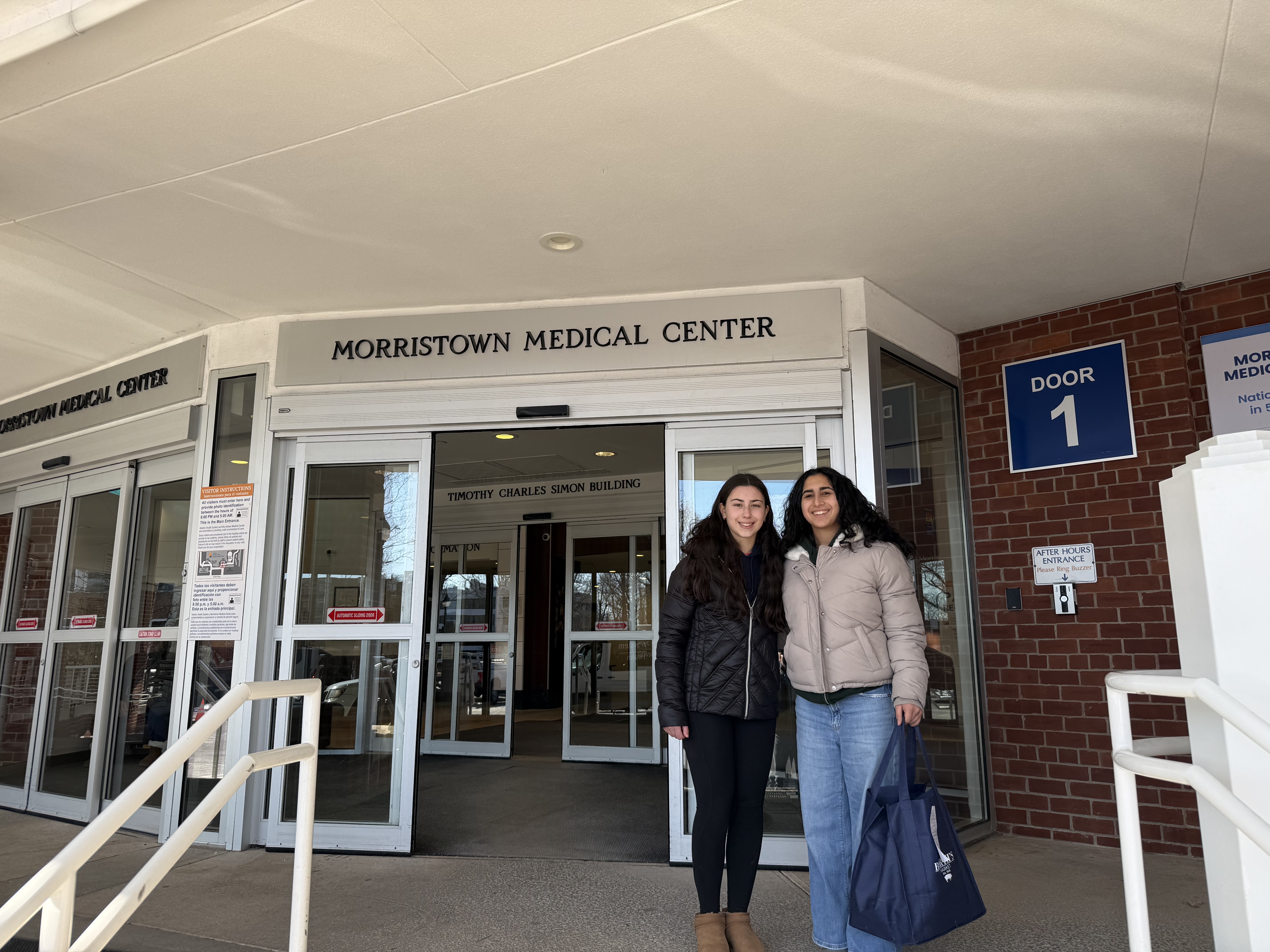 COPE members posing together during a hospital visit